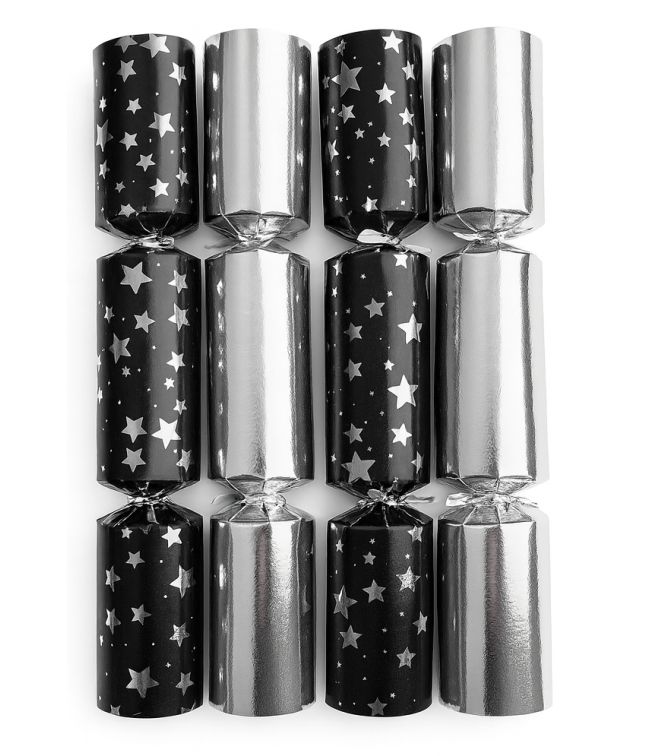 Stort nyår crackers, silver och svarta stjärnor