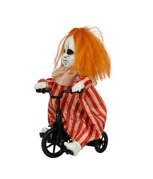 Dukke på cykel 
